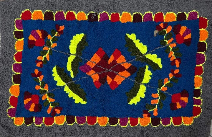 Bloom on Blue, wool on jute, 2026, by Ayesha Abbas Khan